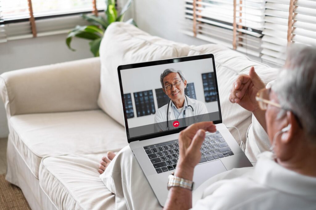 doctor having cost effective video meeting with patient